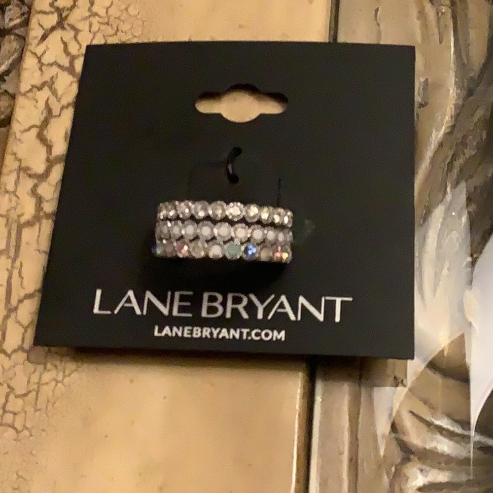 Lane Bryant rings set of 3 solid white and the other one is multicolor s…